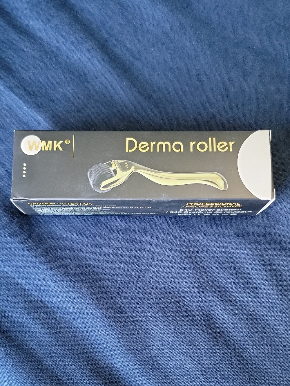 WMK Derma Roller in Black and Gold